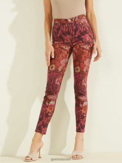 GUESS נשים מכנסי סקיני טרופיים משנת 1981 F8RV256 לבוש הדפס טרופי בטיק ורוד